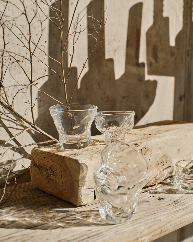 Artisan glass cup with irregular finish