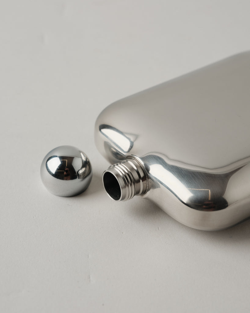 Stainless steel pocket flask with mirror finish