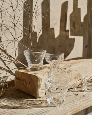 Artisan glass cup with irregular finish